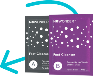 Two packages of NOWONDER Foot Cleanser, one gray and one purple